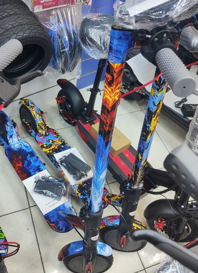 صورة سكوتر كهربائي 36 فولت لون ناري